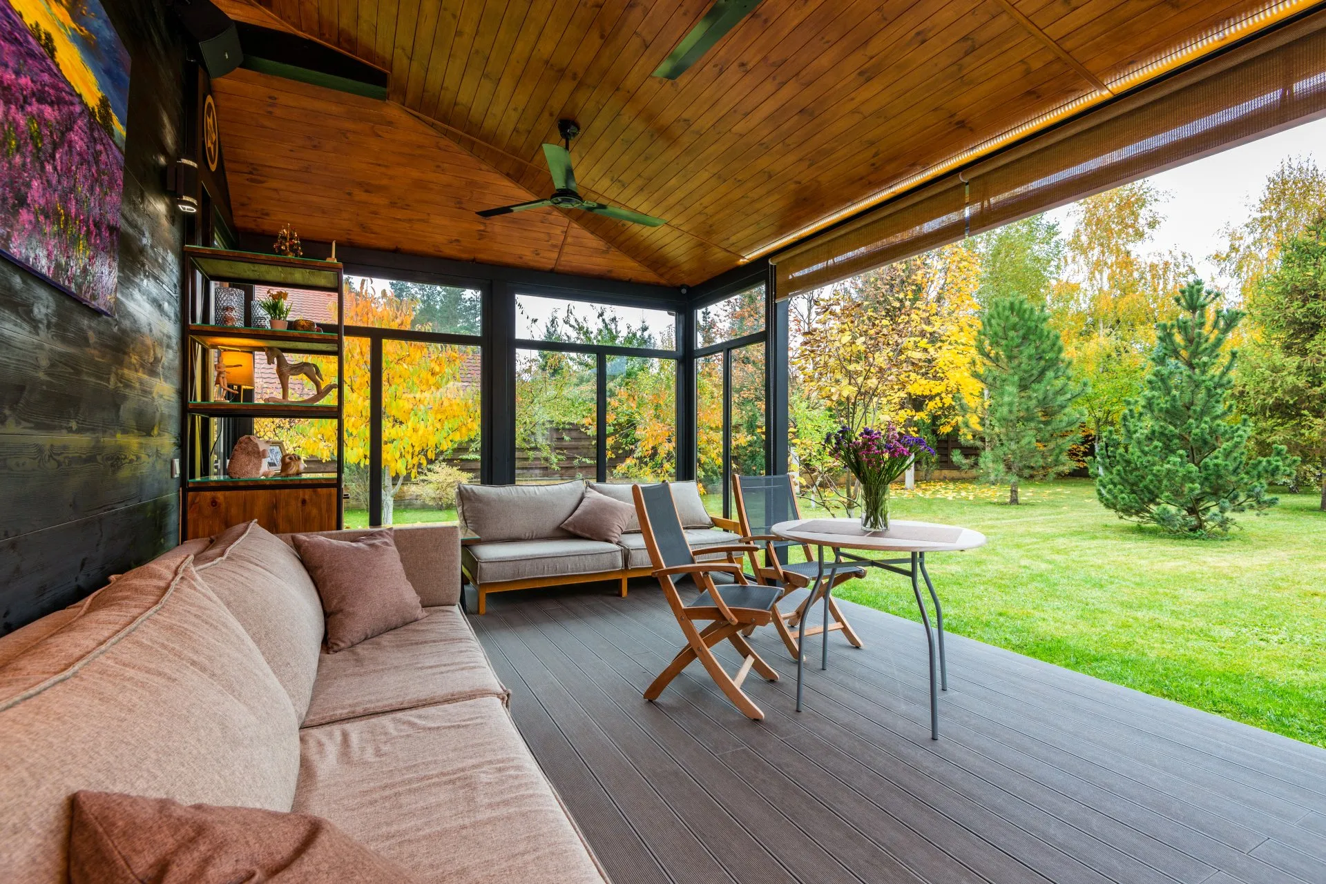 A well-furnished sunroom overlooking a backyard, representing assets involved in trust litigation.